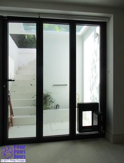 french doors with cat flaps built in